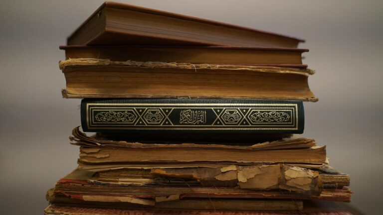 Close-Up Shot of a Stack of Old Books